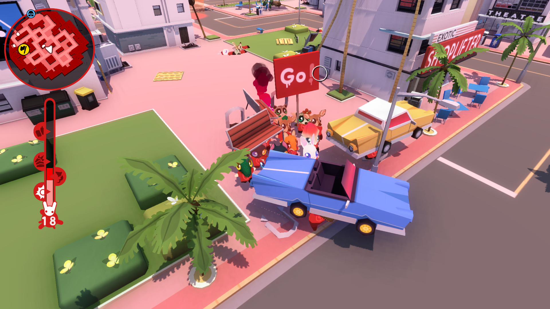 An image of a group of protestors in Anarcute.  One is holding up a sign that says, "Go!" while others carry a park bench and even a car.